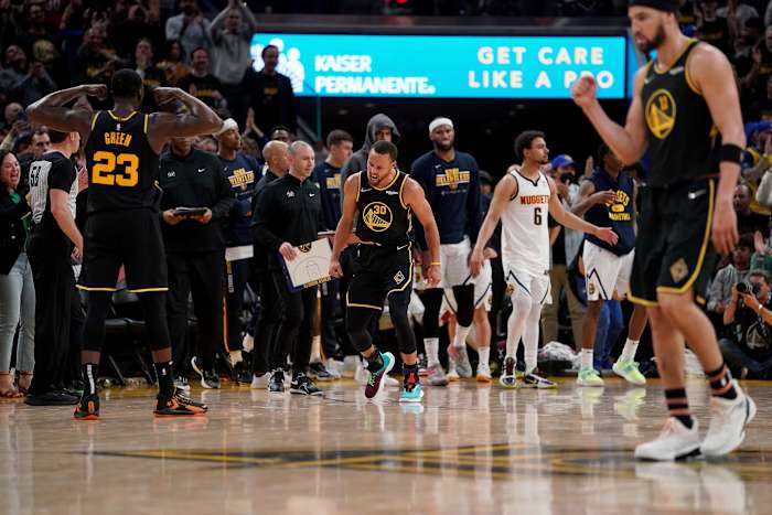 Apr 27, 2022; San Francisco, California, USA; Golden State Warriors guard Stephen Curry (30) reacts after making a layup against the Denver Nuggets in the fourth quarter during game five of the first round for the 2022 NBA playoffs at Chase Center. Mandatory Credit: Cary Edmondson-USA TODAY Sports